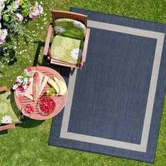 CAMILSON Outdoor Rug 8x10 blue and white bordered design front view