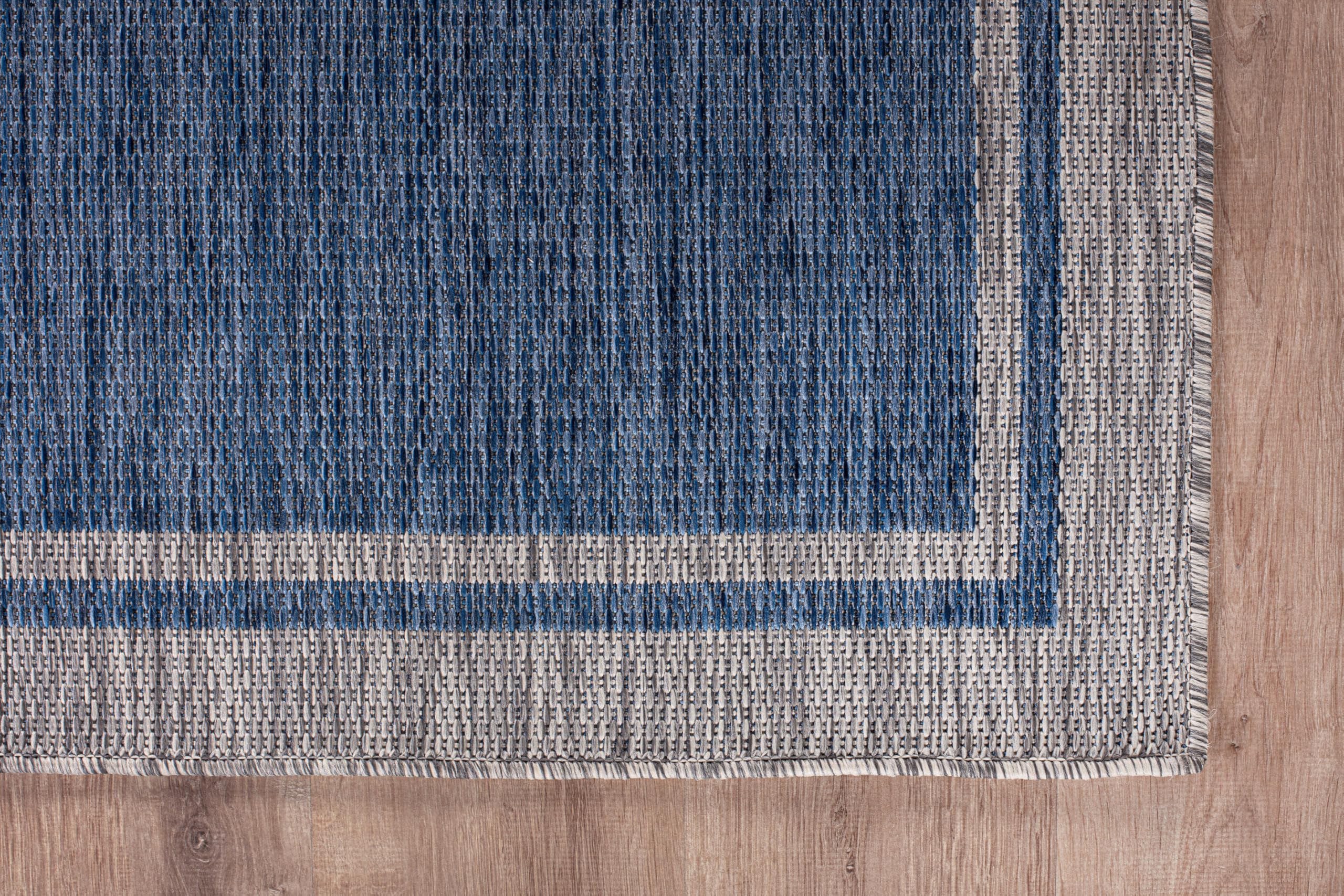 CAMILSON Outdoor Rug in a garden setting