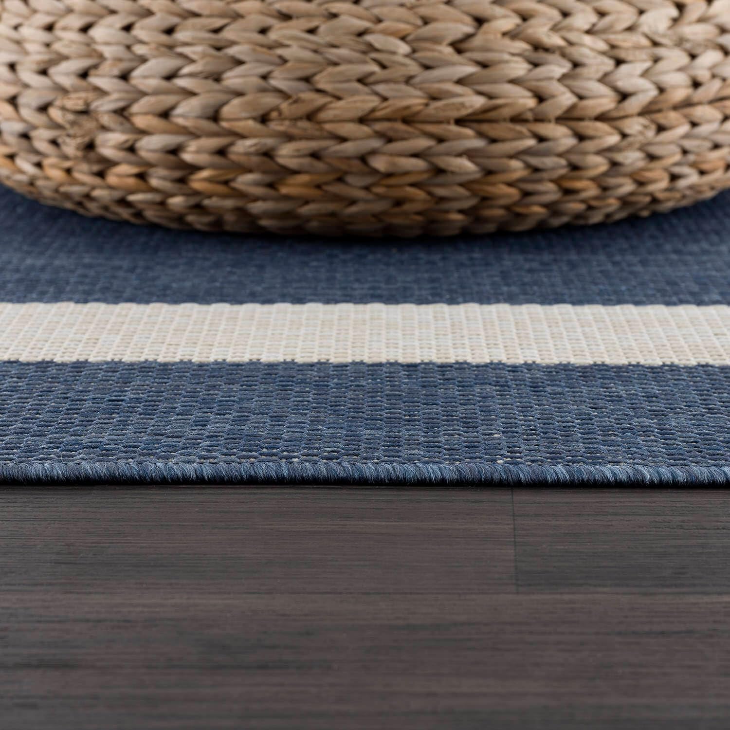 CAMILSON Outdoor Rug in living room setting