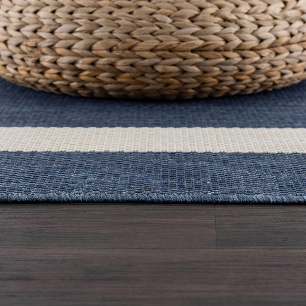 CAMILSON Outdoor Rug in living room setting