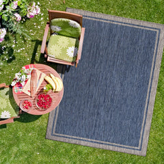 CAMILSON Outdoor Rug rolled up for storage
