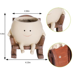 Camotank Smiley Face Rocking Chair Planter side view with plants