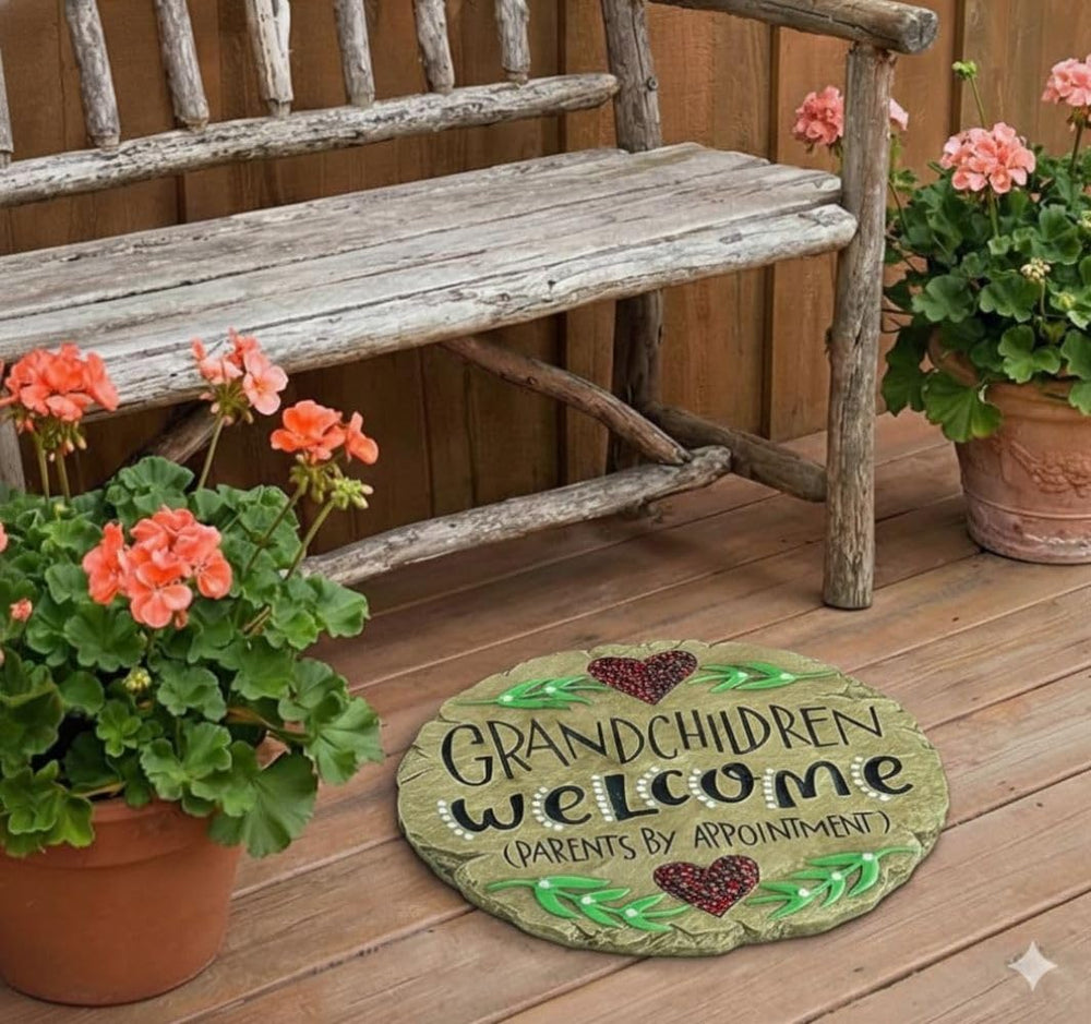 Carson Grandchildren Welcome Garden Stone next to flowers on a porch