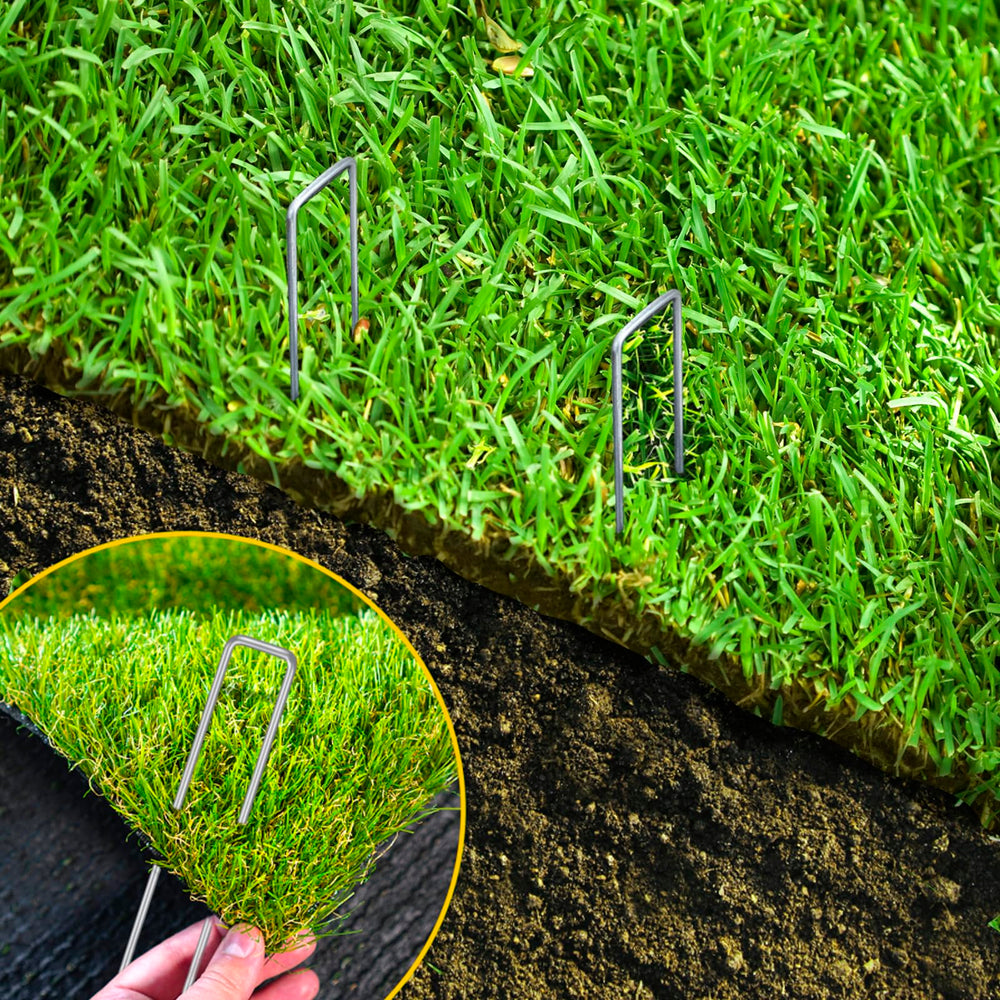 CEWOR landscape staples being used on fabric