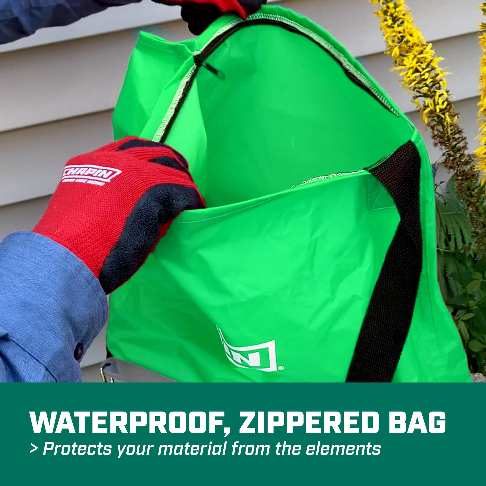 CHAPIN TurfPro handheld bag spreader green model with seed inside