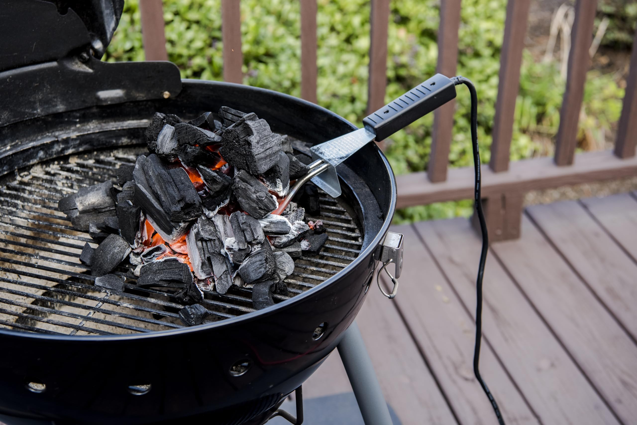 Charbroil Electric Charcoal Starter in use lighting briquettes