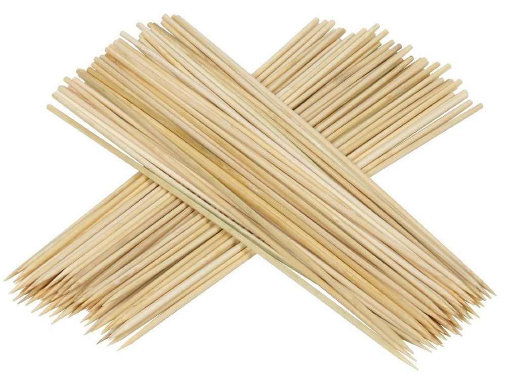 Chef Craft bamboo skewers in a grilling setup with meat and vegetables