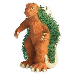 Chia Pet Godzilla planter in a kitchen setting with growing chia
