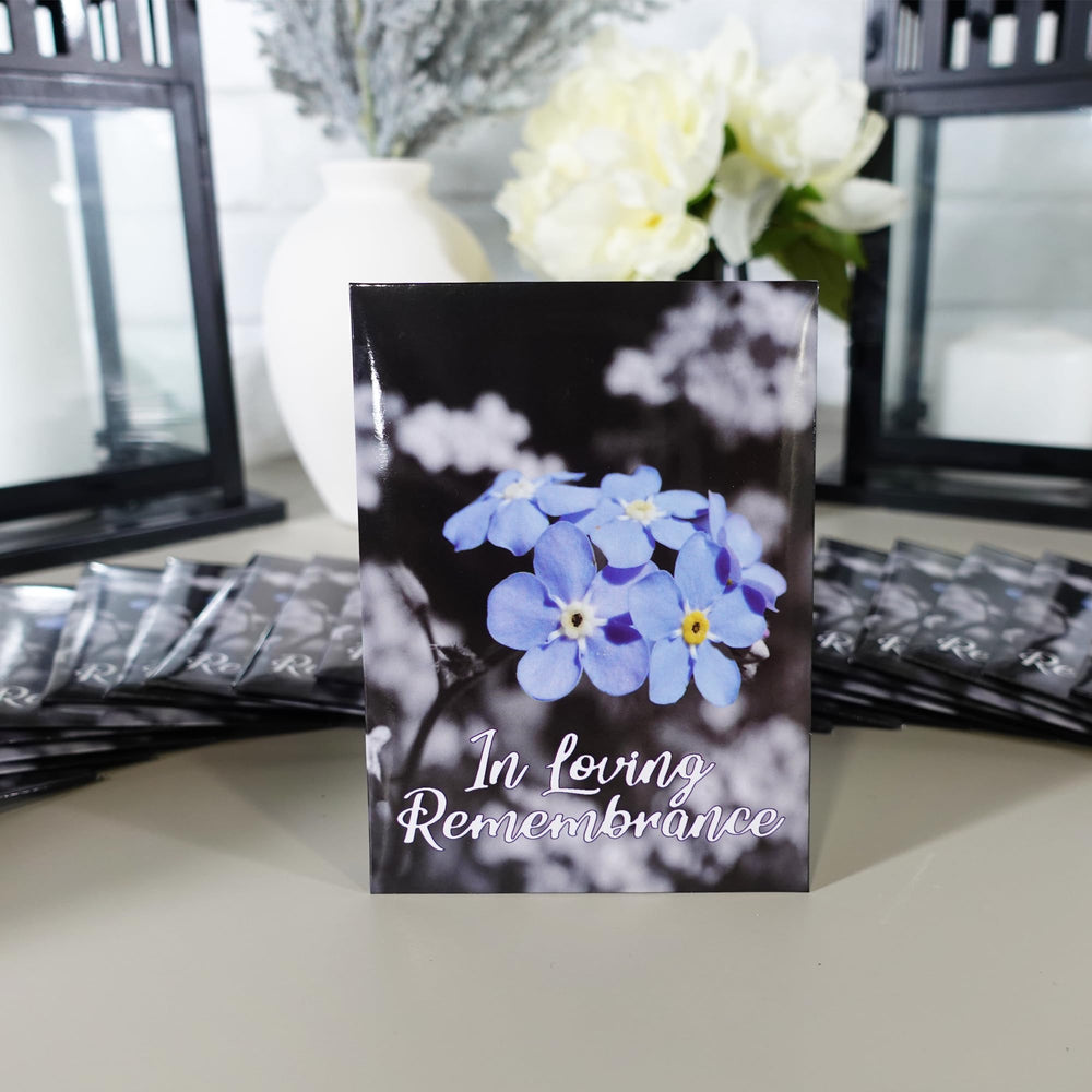 Choobly Forget Me Not seeds displayed on a table for a memorial