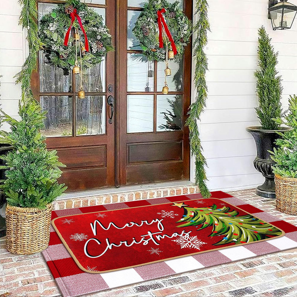 Christmas door mat and checkered rug layered together