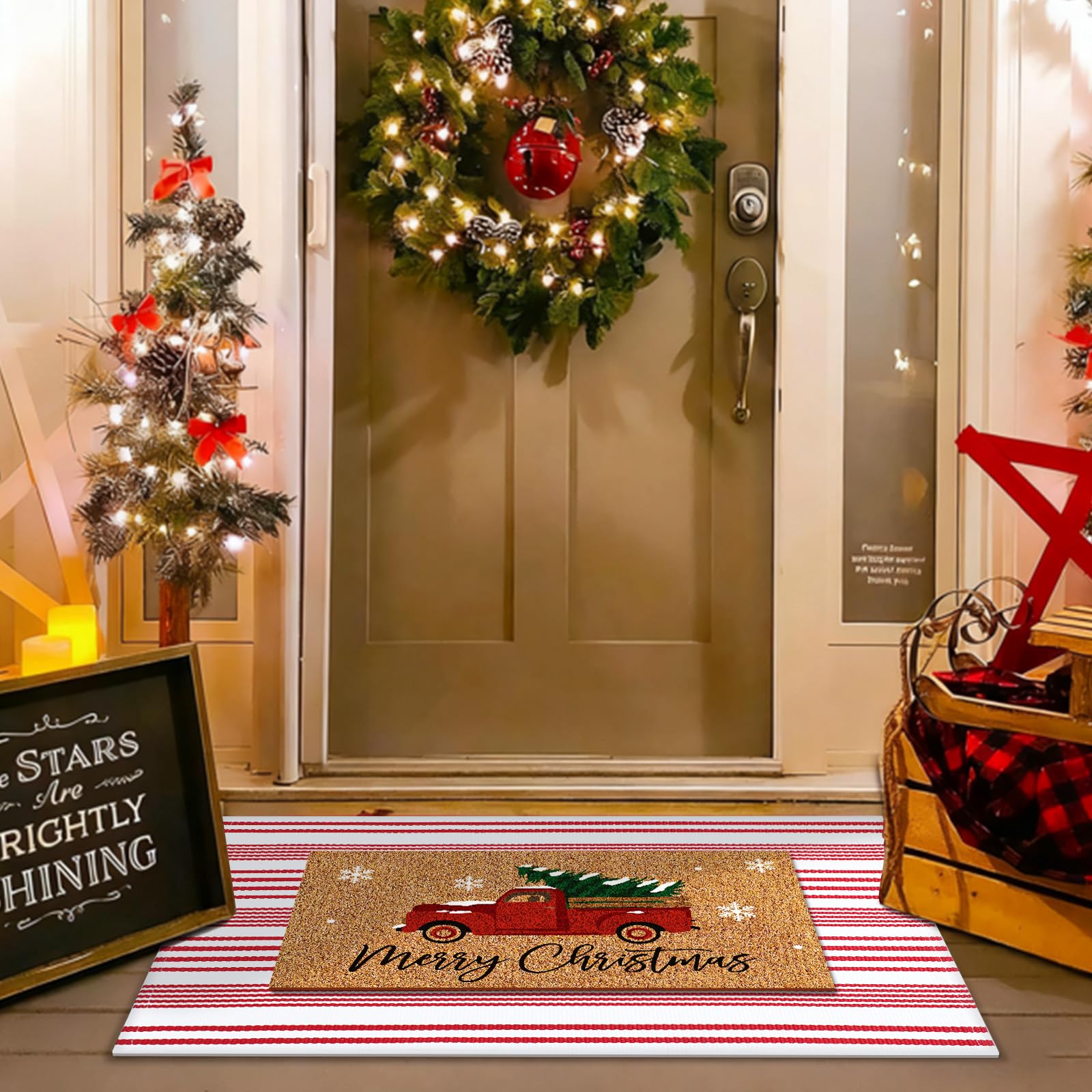Christmas doormat on a porch with festive decor
