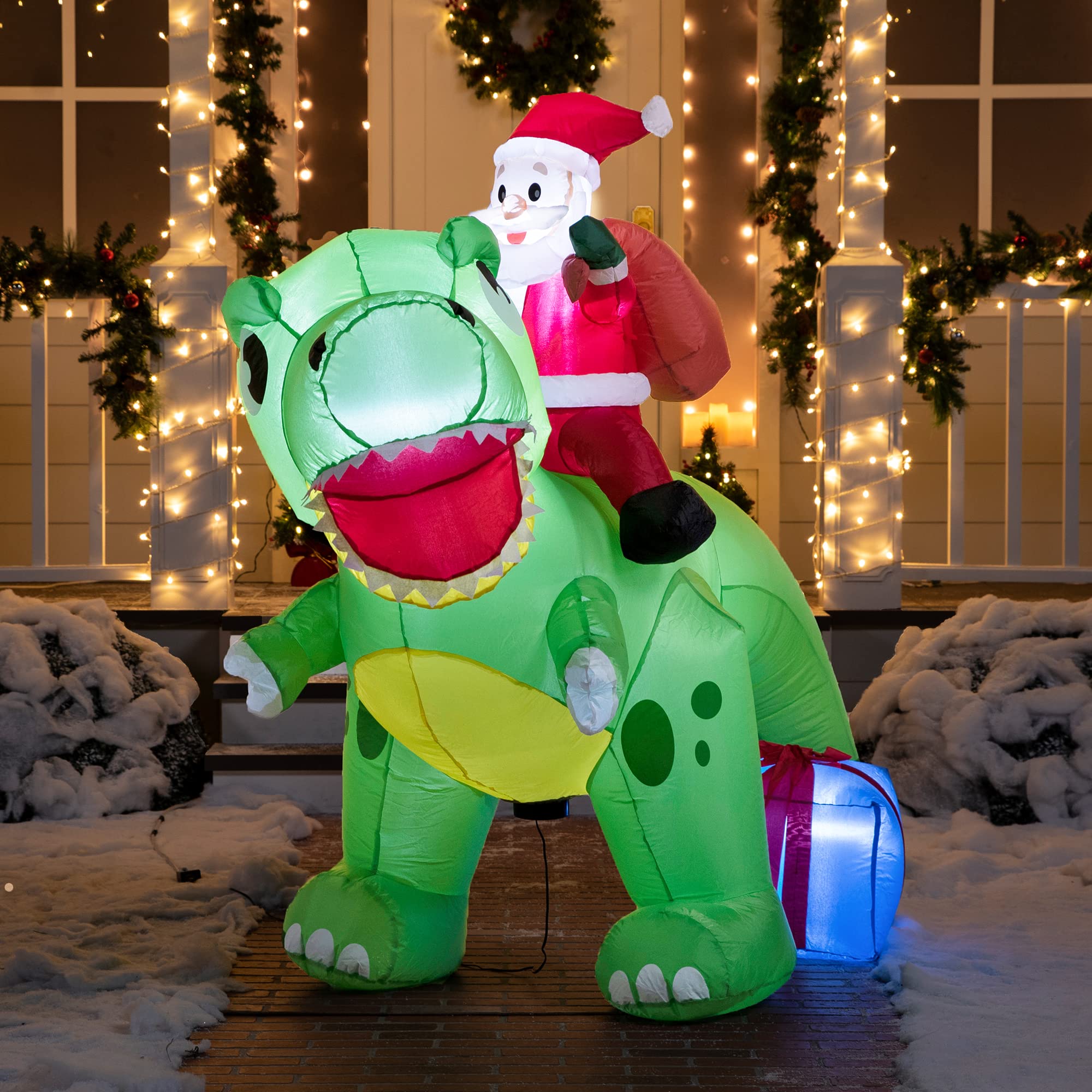 Christmas yard decorated with Joiedomi inflatable dinosaur