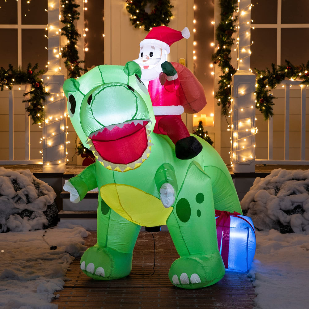 Christmas yard decorated with Joiedomi inflatable dinosaur