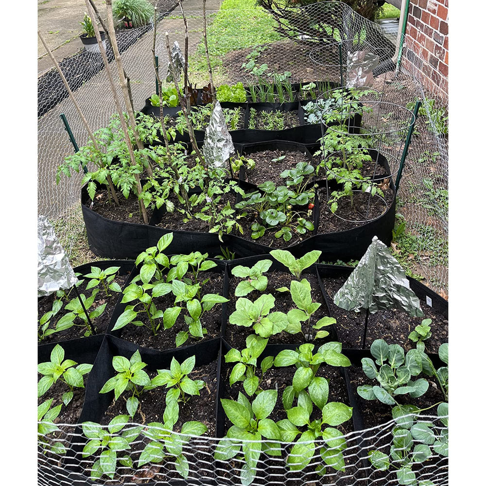 CJGQ Fabric Raised Garden Bed compactly folded for storage