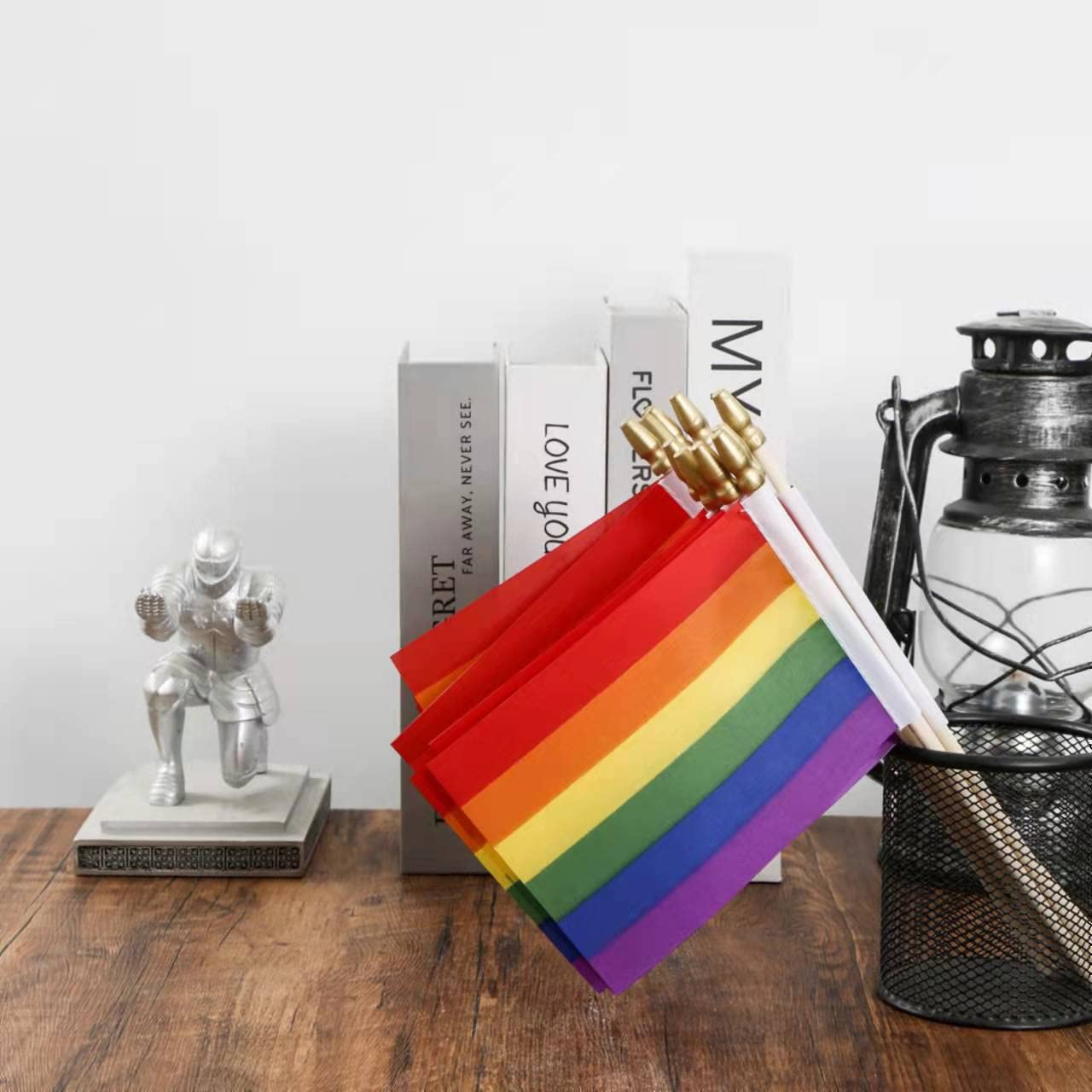Ckexin mini rainbow flags in hand during a pride parade
