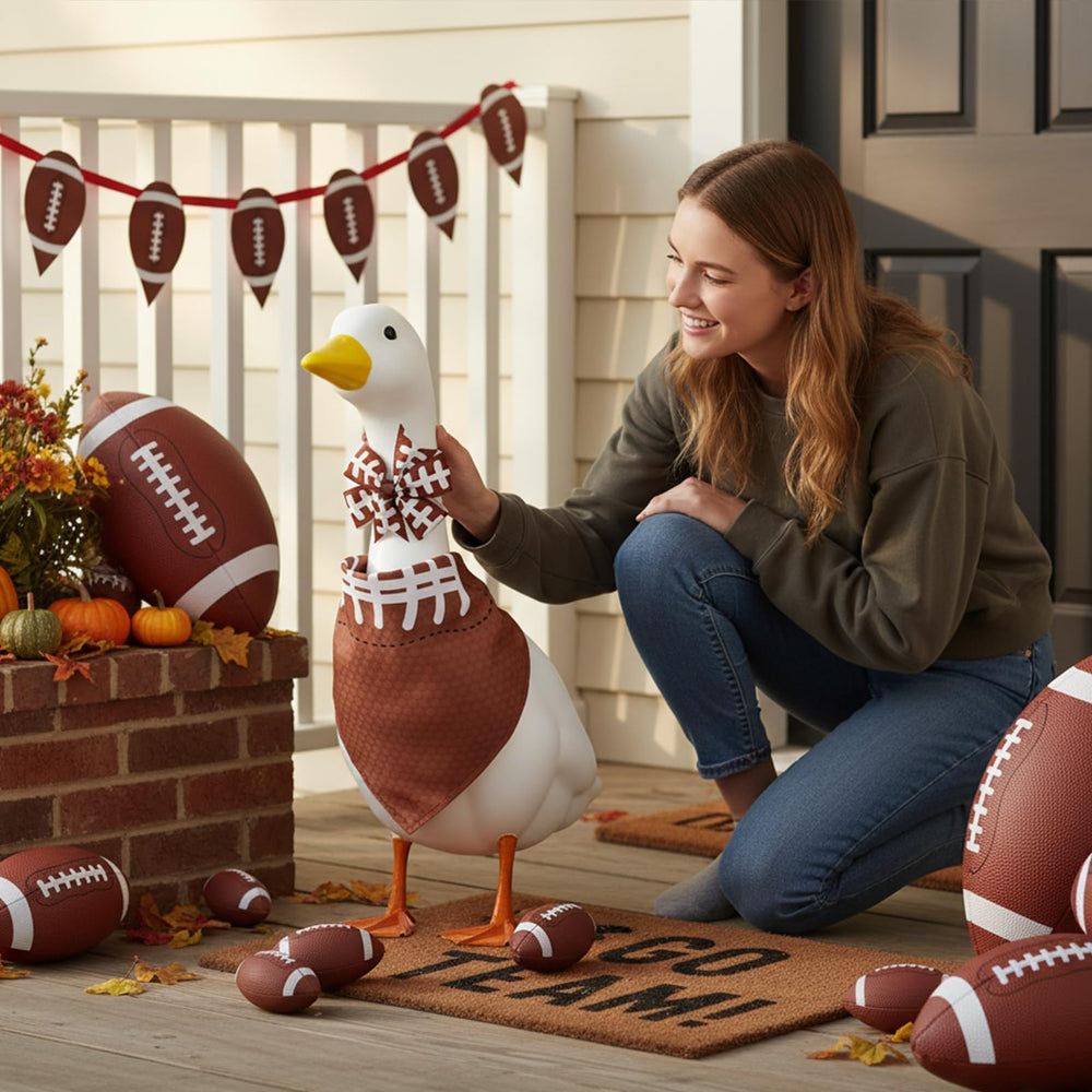 Close-up of Aposwow football-themed garden goose accessories
