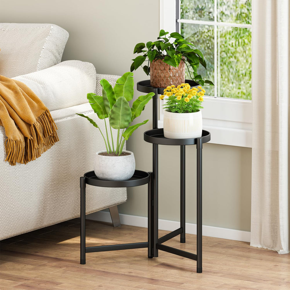 Close-up of Atpddpey plant stand showing metal shelves