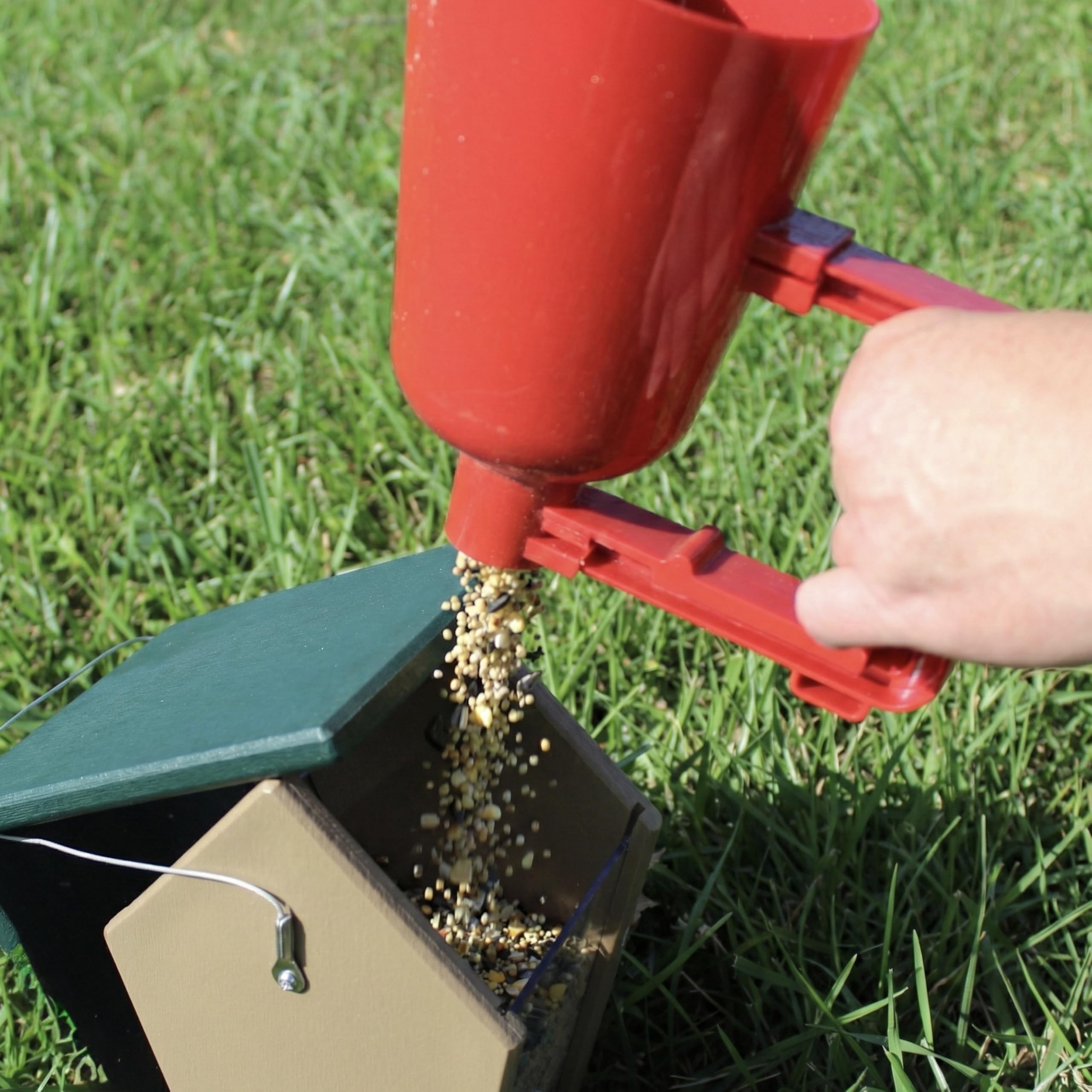 Close-up of Backyard Essentials Bird Seed Scoop handle