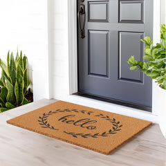 Close-up of Barnyard Designs Hello Wreath Doormat showing coir texture