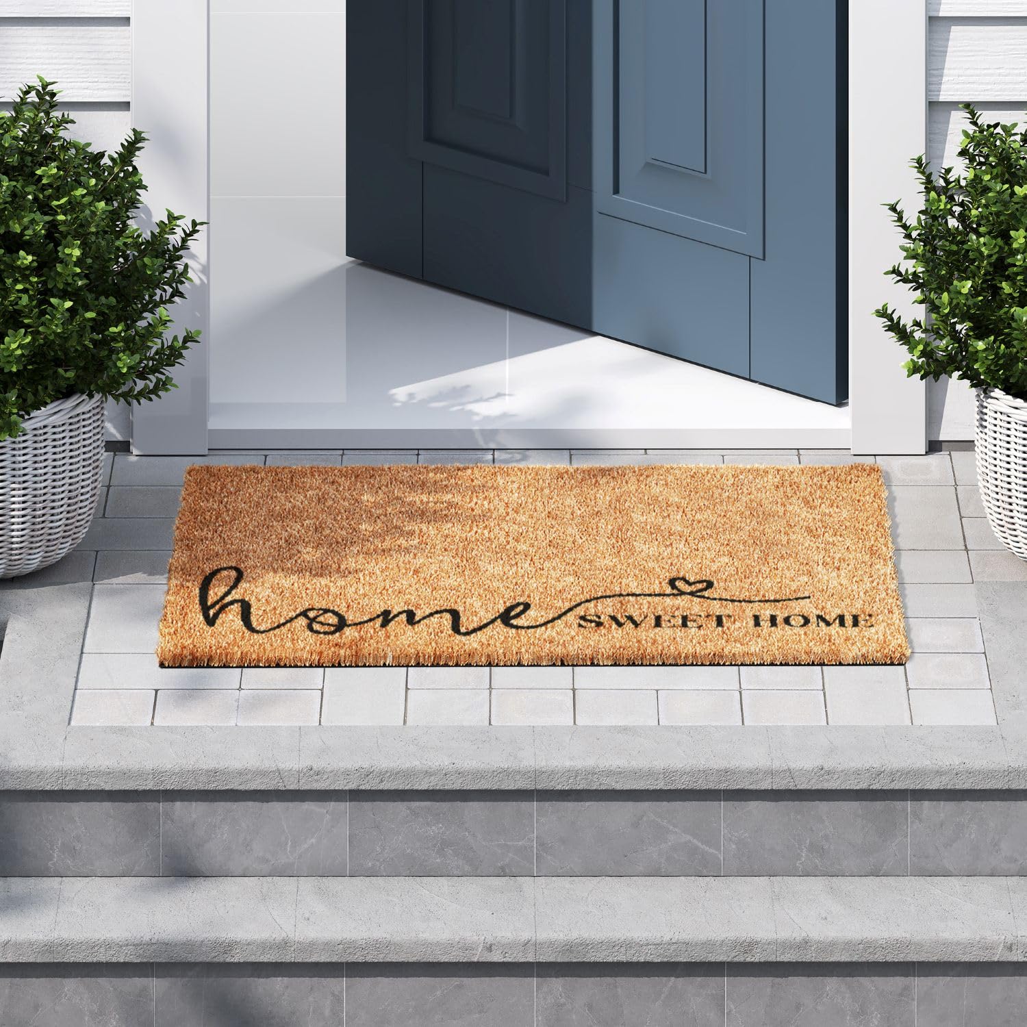 Close-up of Barnyard Designs Home Sweet Home Doormat script