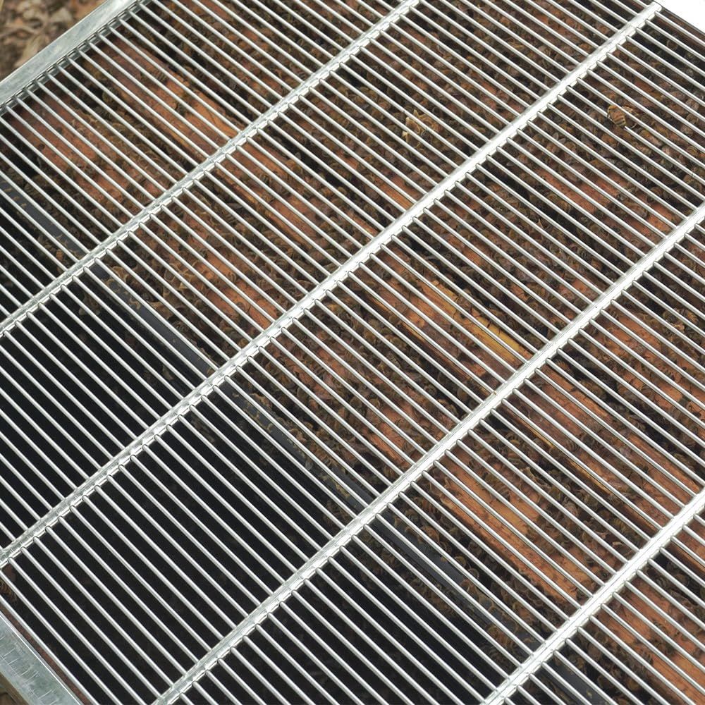 Close-up of BEEXTM Queen Excluder metal mesh