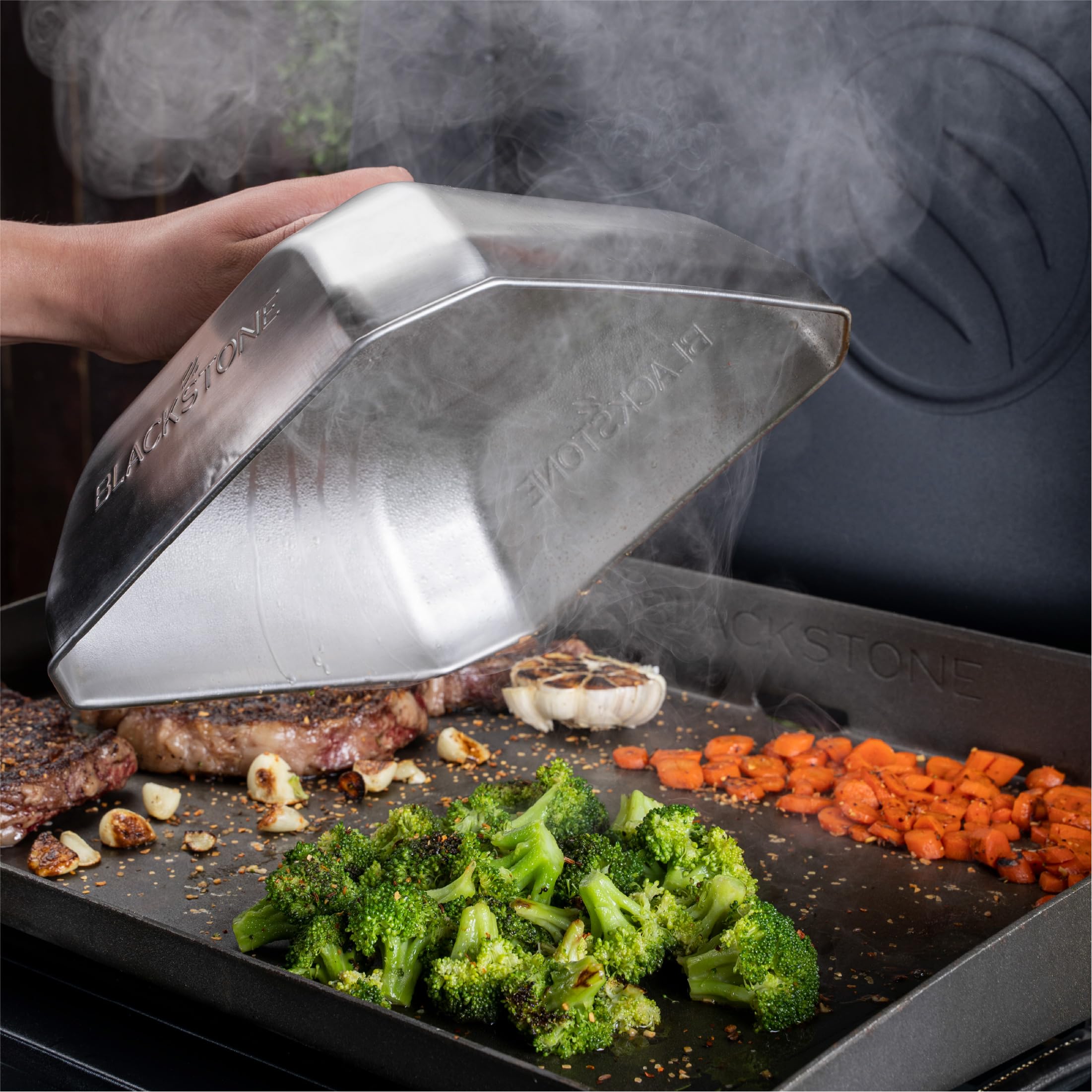 Close-up of BLACKSTONE Medium Square Basting Cover stainless steel finish