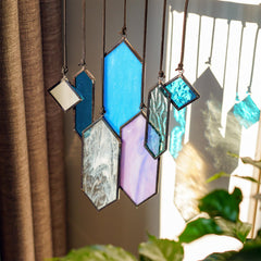 Close-up of blue stained glass suncatcher