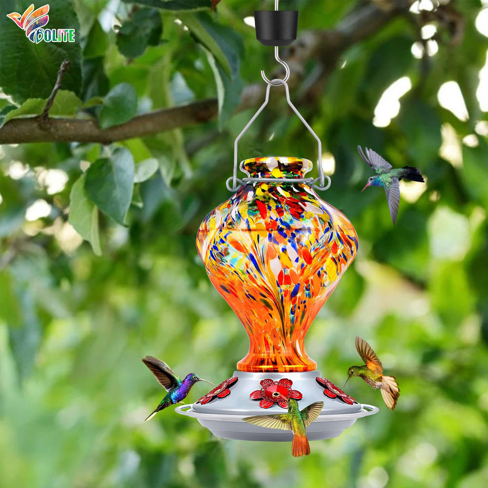 Close-up of BOLITE hummingbird feeder's bee-resistant feeding ports