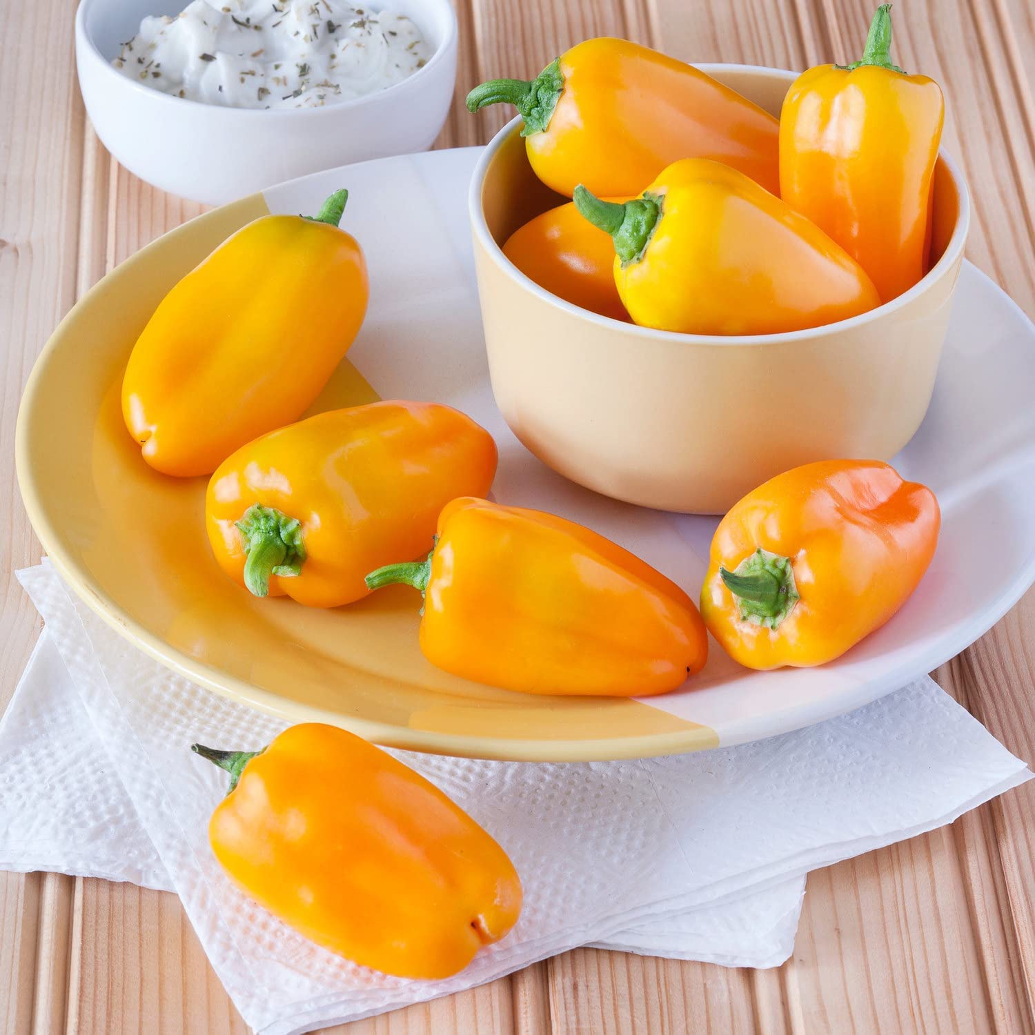 Close-up of Bonnie Plants Orange Snacking Peppers, bright orange colour