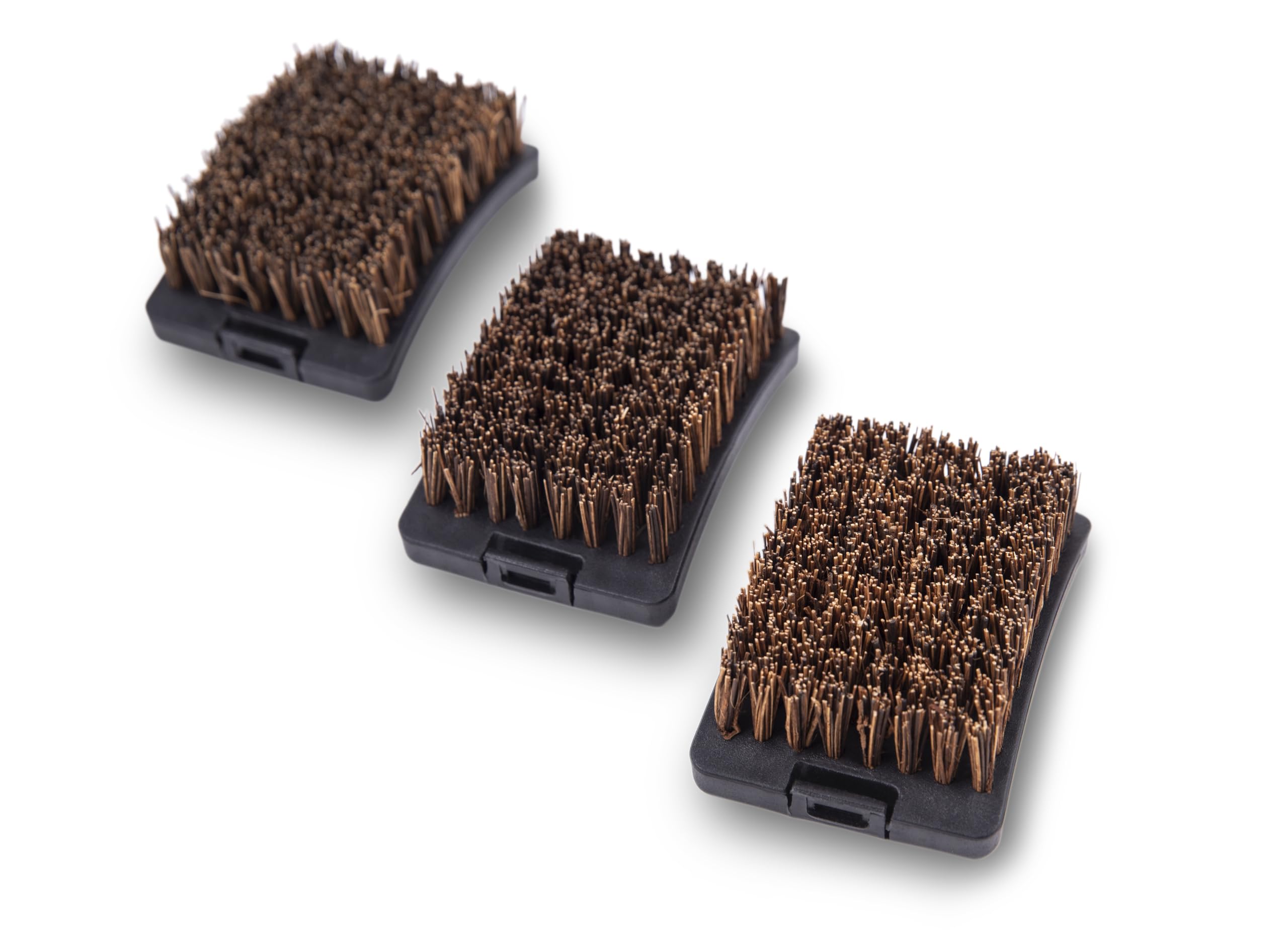 Close-up of Broil King palmyra grill brush head showing natural fibers
