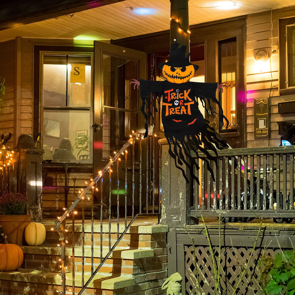 Close-up of COCHIE Halloween garden flag with tassel streamers