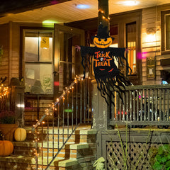 Close-up of COCHIE Halloween garden flag with tassel streamers