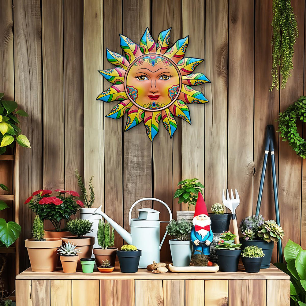 Close-up of Daogtc Metal Sun Wall Decor showing warm colour tones