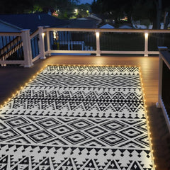Close-up of DiiKoo outdoor rug showcasing LED strip light