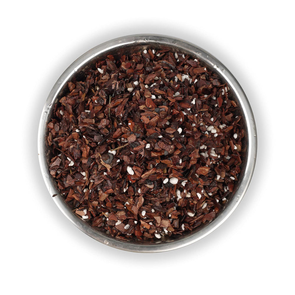 Close-up of Doter Orchid Potting Mix showing bark and perlite