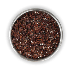 Close-up of Doter Orchid Potting Mix showing bark and perlite