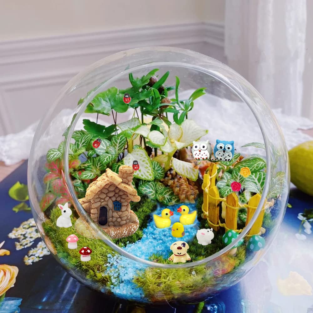 Close-up of Dracarys fairy garden accessories with ladybugs and miniature animals
