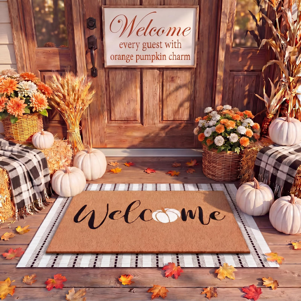 Close-up of Drydiet doormat with pumpkin accent and welcome lettering