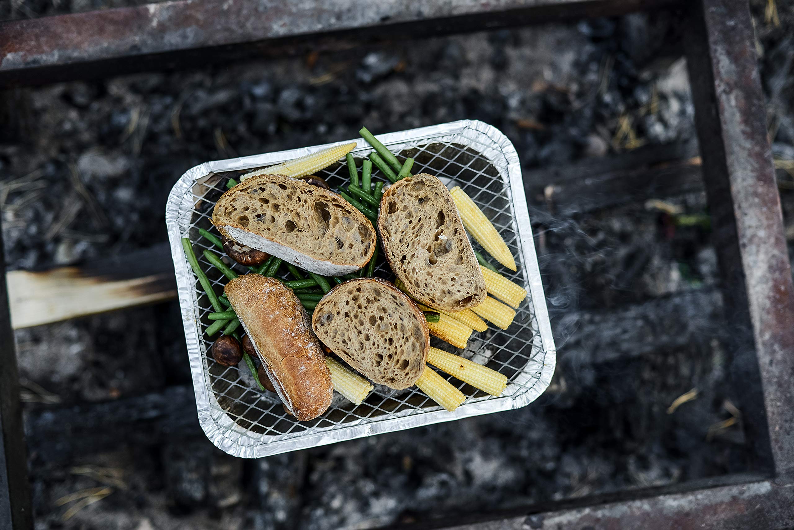 Close-up of EZGRILL charcoal and grill grate