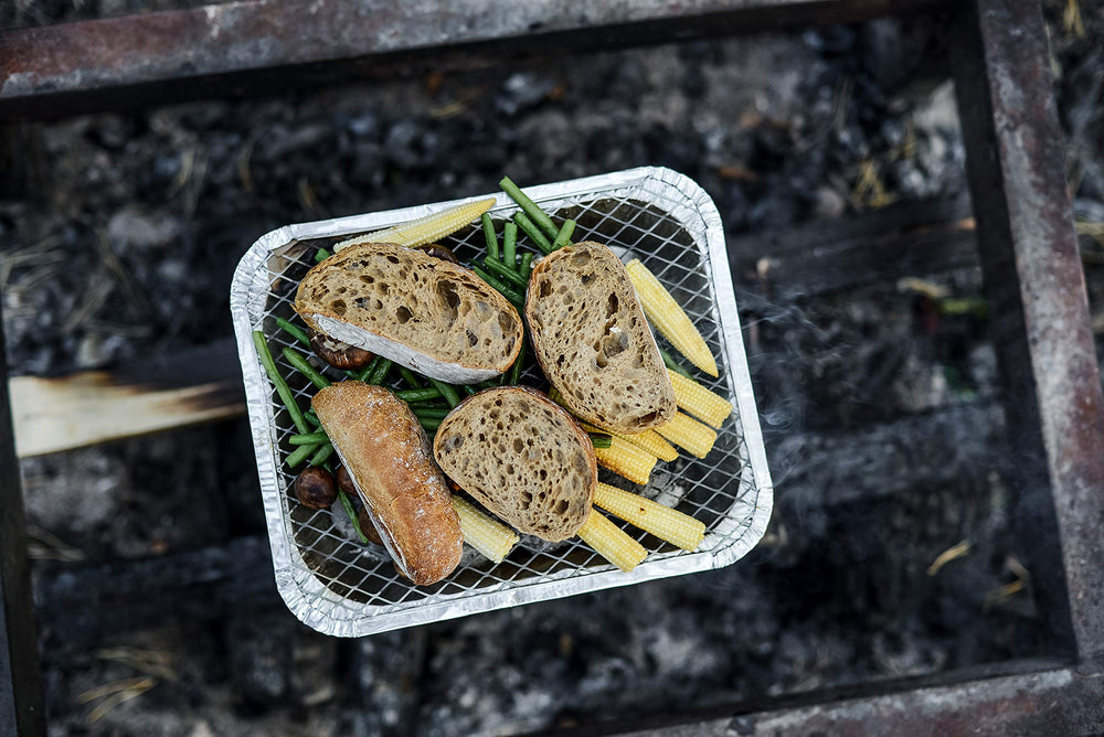 Close-up of EZGRILL charcoal and grill grate