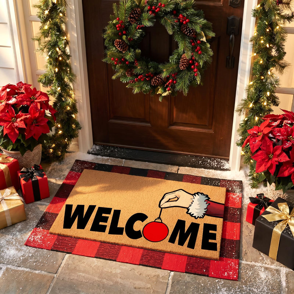 Close-up of festive Santa ornament on Christmas doormat