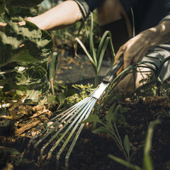 Close-up of Fiskars Xact Hand Rake tines showing flexibility