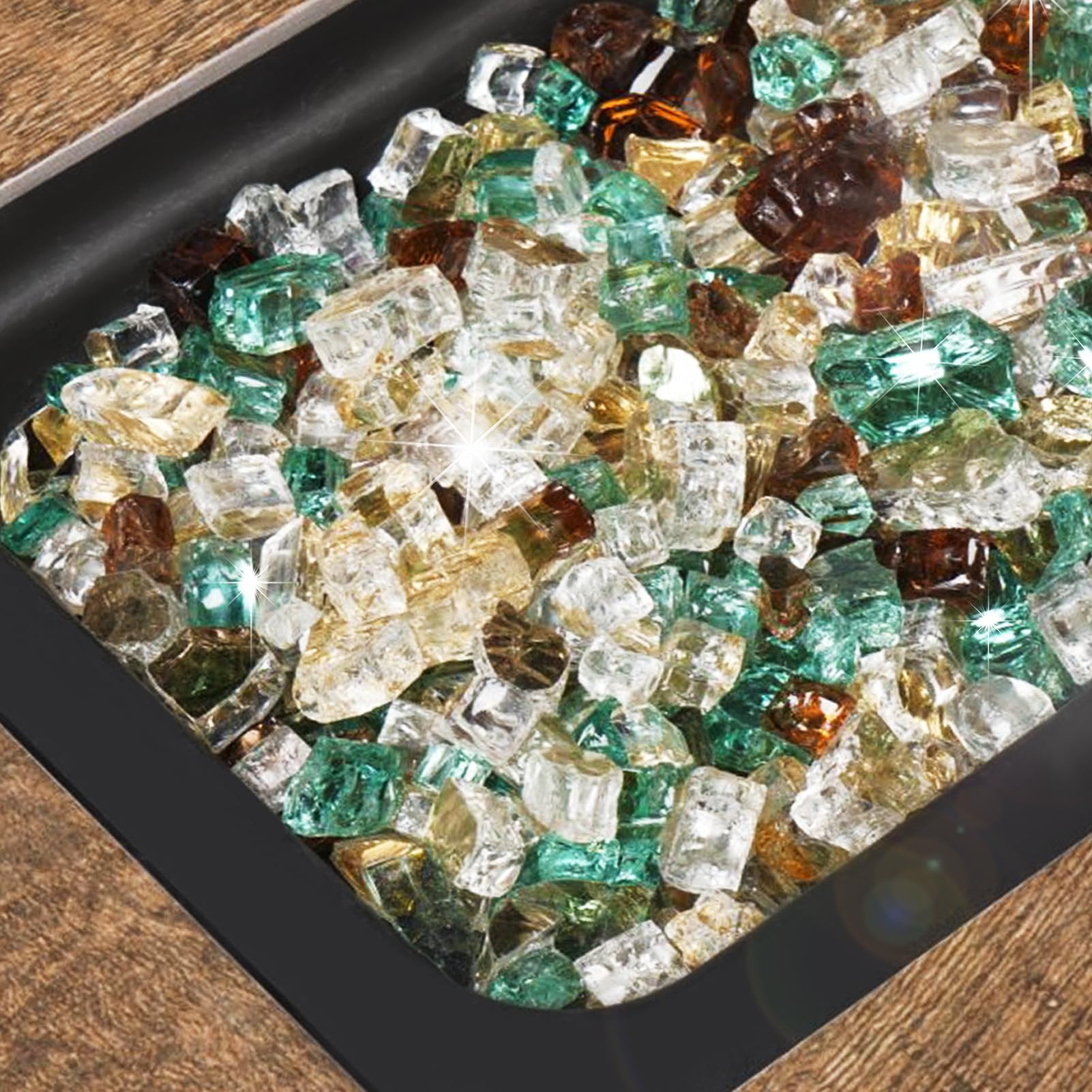 Close-up of GASPRO fire glass reflecting flames