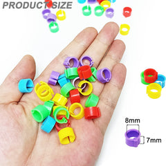 Close-up of Gmeily 8mm leg bands showing all five colours