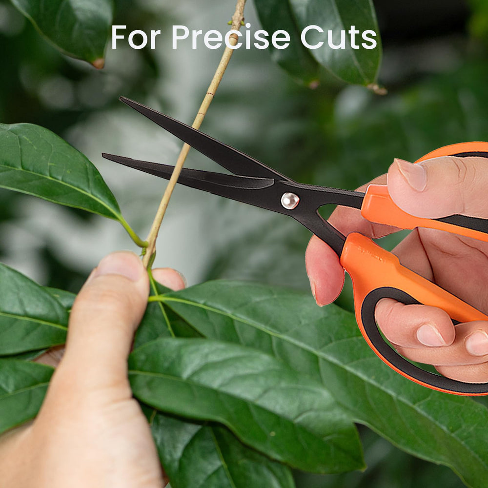 Close-up of GROWNEER Trimming Scissors cutting a plant
