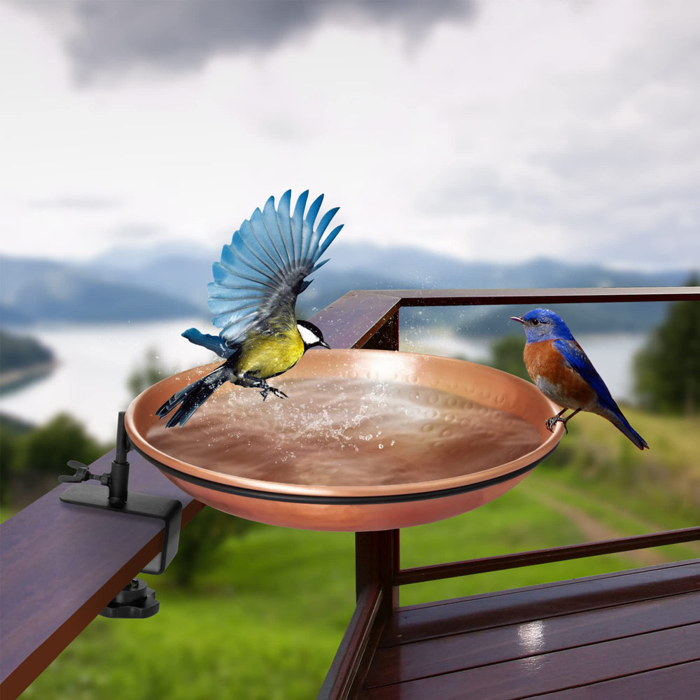 Close-up of hand-hammered pure copper bird bath bowl