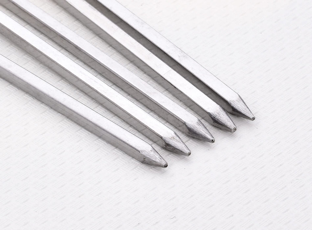 Close-up of HONSHEN square barbecue skewers showcasing sharp pointed end