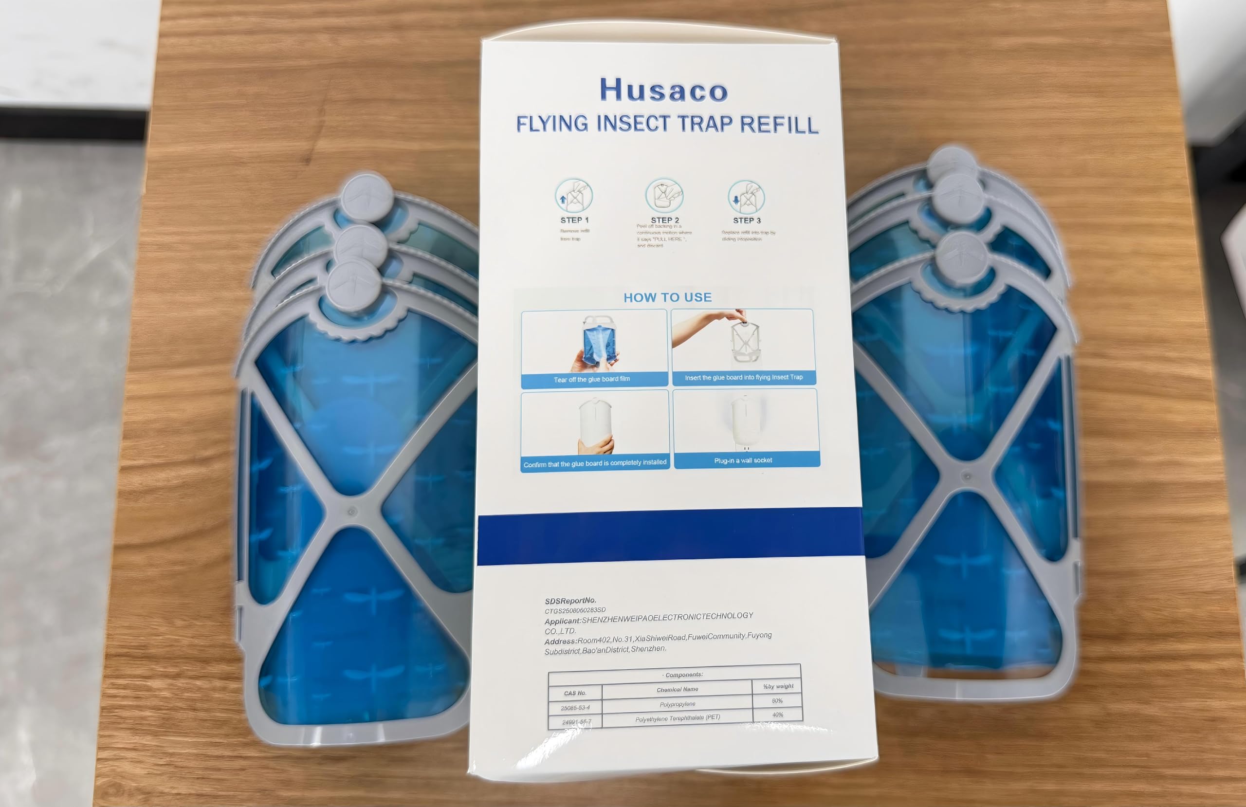Close-up of Husaco insect trap cartridge in blue