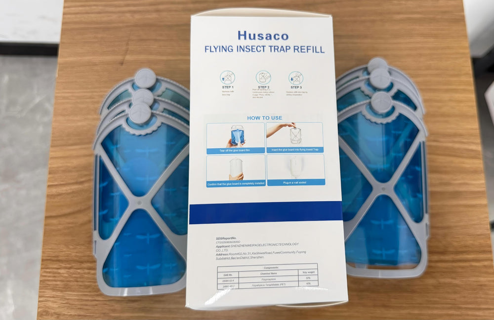 Close-up of Husaco insect trap cartridge in blue