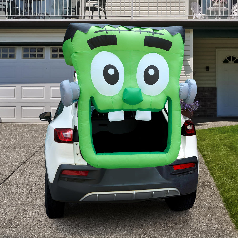 Close-up of Joiedomi inflatable green zombie car plug
